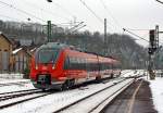 Der 442 103 / 603 ein dreiteiliger Bombardier Talent 2 als RE 9 - Rhein-Sieg-Express (Aachen - Kln - Siegen) fhrt am 26.01.2013 in den Bahnhof Betzdorf/Sieg.