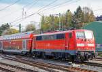   Die 111 093-1 (91 80 6111 093-1 D-DB) der DB Regio NRW schiebt am 17.04.2015, den RE 9  (rsx - Rhein-Sieg-Express) Aachen - Köln - Siegen, in den Bahnhof Betzdorf/Sieg.