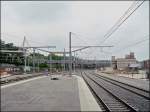 Eine einsame Fotografin am Ende des Bahnsteigs an der nrdlichen Ausfahrt des Bahnhofs Lige Guillemins am 28.06.08. (Hans)