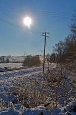 Diverses/394948/eine-winterliche-impression-mit-vollem-gegenlicht 
Eine winterliche Impression mit vollem Gegenlicht an der Oberwesterwaldbahn  (Bahnstrecke Au - Altenkirchen) in Obererbach am 28.12.2014.