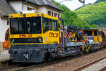   Die beiden CFL IF Robel 703 (99 82 9210 703-9 L-CFLIF) und 705 (99 82 9210 705-4 L-CFLIF) sind am 14.05.2016 mit einem Schotterzug im Bahnhof von Goebelsmühle (Giewelsmillen) abgestellt.