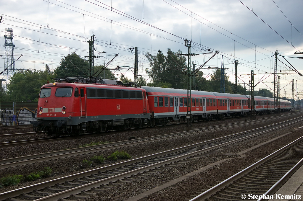 110 491-8 mit einem Sonderzug, bei der Einfahrt in Hamburg-Harburg. 13.09.2012