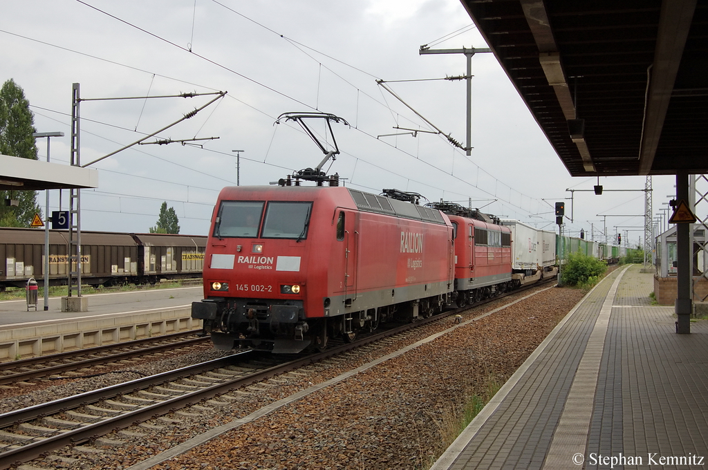 145 002-2 & 151 003-1 (kalt) mit dem Hangartner in Nauen Richtung Friesack(Mark) unterwegs. 28.07.2011