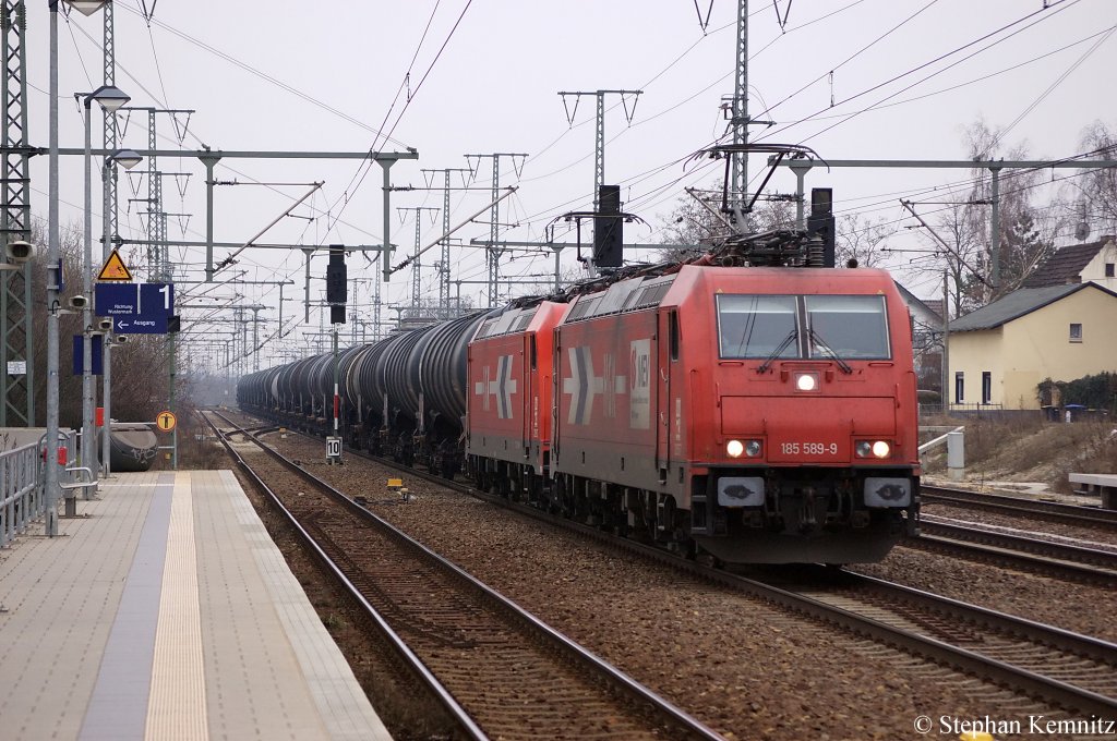 185 589-9 (HGK 2057) & 185 584-0 (HGK 2052) mit einem Kesselzug der entweder mit Dieselkraftstoff oder Gasl oder Heizl (leicht) befllt ist in Golm in Richtung Marquardt unterwegs. 18.02.2011