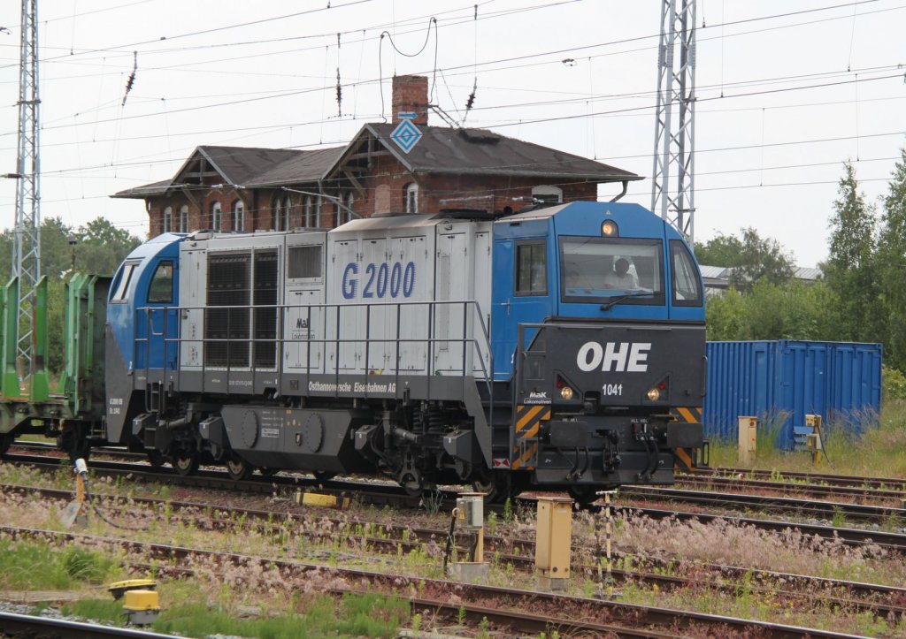 OHE-1041 mit Leerzug von Stendal-Niedergrne nach Rostock-Bramow bei der Durchfahrt im Rostocker Hbf.15.06.2012