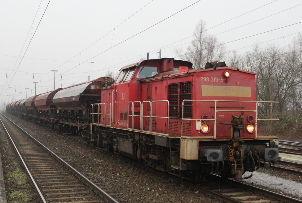 298 319-5 mit D�ngerzug von Rostock-Bramow nach Poppendorf kurz vor der Ausfahrt in WRB.02.02.2019 