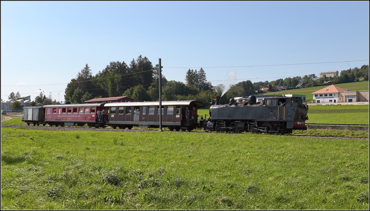 Mit der E 206 nach Tavannes. La Traction Sonderzug bei Le Noirmont. August 2019.