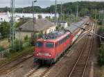 115 346 am 25.August 2010 mit dem EC 379 Binz-Brno bei der Einfahrt in Bergen/Rgen.