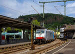 Die an die LINEAS Group NV/SA vermietete 186 446-1 (91 80 6186 446-1 D-Rpool) fährt am 09.06.2022 mit einem gemischten Güterzug durch den Bahnhof Betzdorf (Sieg) in Richtung Köln.