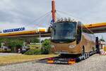=Scania steht verlastet auf einem Tieflader des schwedischen Abschleppunternehmens JB Bilbrgning.