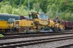 Plasser & Theurer Schnellschotterplaniermaschine SSP 110 SW der  Kabelfresser  der Deutsche Gleisbau Union (DGU), Koblenz, abgestellt am 13.05.2012 in Betzdorf/Sieg.