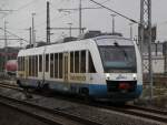 Seltener Gast auf der Strecke Rostock-Gstow:OLA79763 von Rostock Hbf nach Gstrow bei der Ausfahrt im Rostocker Hbf.26.11.2011