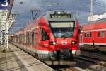 RE 13009 von Rostock Hbf nach Sassnitz bei der Ausfahrt im Rostocker Hbf.17.12.2011