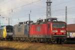 RBH109(143 936-39+RBH 110(143 084-2)+ER20-006 abgestellt in Hhe Haltepunkt Rostock-Dierkow.21.12.2011