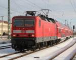 143 303-6 mit S2 von Gstrow nach Warnemnde bei der Eifahrt im Rostocker Hbf.11.02.2012