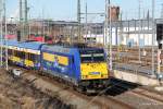 146 520-2 mit InterConnex Warnemnde-Leipzig bei der Ausfahrt im Rostocker Hbf.26.02.2012