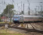 101 042-0 mit IC 2213 von Ostseebad Binz nach Stuttgart Hbf bei der Ausfahrt im Rostocker Hbf.31.07.2015