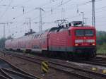 RE 38590 von Berlin Hbf(tief)nach Warnemnde bei der Einfahrt im Rostocker Hbf(26.09.10)