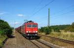 155 120-9 mit Tanoos Ganzzug in Demker und ist auf dem Weg zum Kali-Werk in Zielitz.