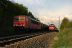 155 075-5 mit einem Kesselzug  Benzin oder Ottokraftstoffe  fuhr aus dem Bahnhof Nennhausen raus und fuhr in Richtung Rathenow weiter.