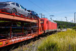 Die 185 388-6 (91 80 6185 388-6 D-DB) der DB Cargo AG fährt am 28 Juni 2024 mit einem beladenen Autotransportzug (Wagen der Gattung Laaeffrs 560.1) Gattung Laaers 560.1 der DB Cargo Logistics