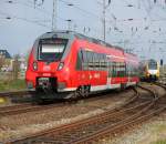 442 346 als S1 von Warnemnde nach Rostock Hbf bei der Ausfahrt in Warnemnde neben an kam 445 103-5 langsam raus.02.05.2015