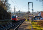 Zwei gekuppelte Bombardier Talent 2 (der vierteilige 442 259 / 442 759 und der fünfteilige 442 802 / 442 302) der DB Regio NRW rauschen am 28.02.2022, als RE 9 rsx - Rhein-Sieg-Express (Aachen -