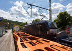 Da bin ich am 16 Juli 2025 gerade noch mit den Güterwagen der in Richtung Siegen fahrenden DB 187 123 beschäftigt, da kommt in Gegenrichtung (Köln) die an die HELROM GmbH (Frankfurt am