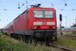 143 193-1 mit RE 18591 von Warnemnde nach Berlin Hbf(tief)abgestellt im Bahnhof Warnemnde.30.06.2012