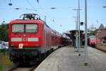 112 111-0 mit RE 18591 von Warnemnde nach  Berlin Hbf(tief)abgestellt im Bahnhof Warnemnde.29.05.2014