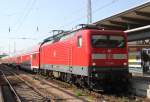 112 106 mit RE 4314 von Rostock Hbf nach Hamburg Hbf kurz vor der Ausfahrt im Rostocker Hbf.23.05.2012