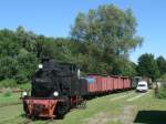 99 4652 und der gesamte Bestand an Wagen die im Freigelnde abgestellt sind,am 06.Juli 2011,in Putbus.