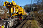 Die an die BEG - Bocholter Eisenbahngesellschaft mbH vermietete 4185 132-2 „Christa“ (92 80 4185 132-2 D-NXRL), eine Vossloh DE 18 der Nexrail AssetCo Sàrl (Luxembourg) fährt am 17 Februar 2025, mit dem Kirow KRC 1200 Kranzug der MGW Gleis- und Weichenbau-GmbH & Co.KG (Berlin), durch Scheuerfeld/Sieg in Richtung Siegen. Hinter der Lok sind der Schutzwagen D-MGWB 37 80 3999 232-4, der KRC 1200 Kranwagen D-MGWB 99 80 9519 003-4 und der Gegenlastwagen D-MGWB 99 80 9310 031-6.

Hier der Kirow Multi Tasker Kran KRC 1200, D-MGWB 99 80 9519 003-4, der MGW Gleis- und Weichenbau-GmbH & Co.KG (Berlin), von der Gegengewichtseite (Nachschuss). Der 150 t Kran wurde 2022 von Kirow in Leipzig unter der Fabriknummer MT 2020 171088 gebaut.

TECHNISCHE DATEN:
Baujahr: 2022
Spurweite: 1.435 mm (Normalspur)
Anzahl der Achsen: 8 
Länge über Puffer: 15.000 mm (ohne Ausleger)
Drehzapfenabstand: 8.000 mm
Eigengewicht: 108.000 kg (in Transportstellung ohne Gegengewicht)
Höchstgeschwindigkeit: 19 km/h (Eigenfahrt) / 100 km/h (geschleppt)
Zugelassen für Streckenklasse: CE oder höher
Bremse: KE-GP-mZ (L)
Kleinster befahrbarer Gleisbogen: R = 80m