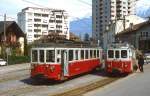 Im Mai 1980 begegnen sich BDe 4/4 111 und der Zahnradtriebwagen BDeh 4/4 der AOMC in Monthey Ville.