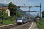 Ein FS ETR 470 als EC 17 von Zürich nach Milano bei der Durchfahrt in Lugano Paradiso. 
5. Mai 2014