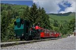 Auf der Planalp wird dem Durst tatkräftig begegnet: die Lok bekommt reichlich Wasser und die Reisendne finden in der Nähe ein lohnendes Restaurant...