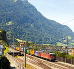   Eine Re 10/10 der SBB Cargo, bestehend aus der Re 6/6 - Re 620 080-2 und einer Re 4/4 - Re 420, fährt am 01.08.2019 mit einem Containerzug durch Arth-Goldau in Richtung Gotthard.