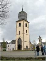Als Wahrzeichen von Mersch steht der  Alte Turm  aus dem Jahre 1709 mit dem Standbild des Drachentöters St Michael, wie ein unbesiegter Ritter auf dem Michaelsplatz. Der Turm erhielt Ende der 90er Jahre einen Weggefährten in Form eines Drachens, der vom Merscher Bildhauer Paul Eyschen gestaltet wurde. 29.03.09 (Hans) 