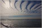 Wolken verteilen sich fächerartig über den Himmel bei Wustrow  (23.09.2017) 