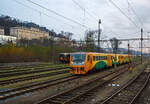 Wir überholen zwei gekuppelte Regionova (814 111/ 914 111 und 914 125/814 125) der České dráhy (ČD) am 24.11.2022 bei Praha-Smichov.